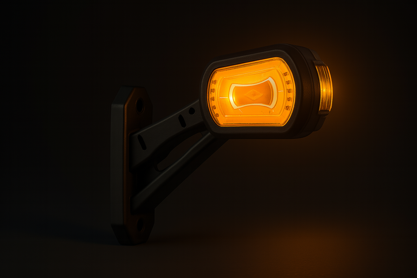 Amber LED outline marker light on a black background glowing brightly.