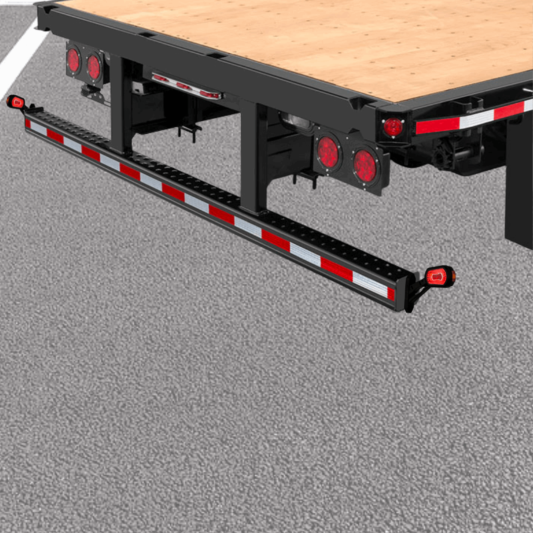 Trailer flatbed with RoadLites safety red LED outline marker lights installed on a trailer bumper.