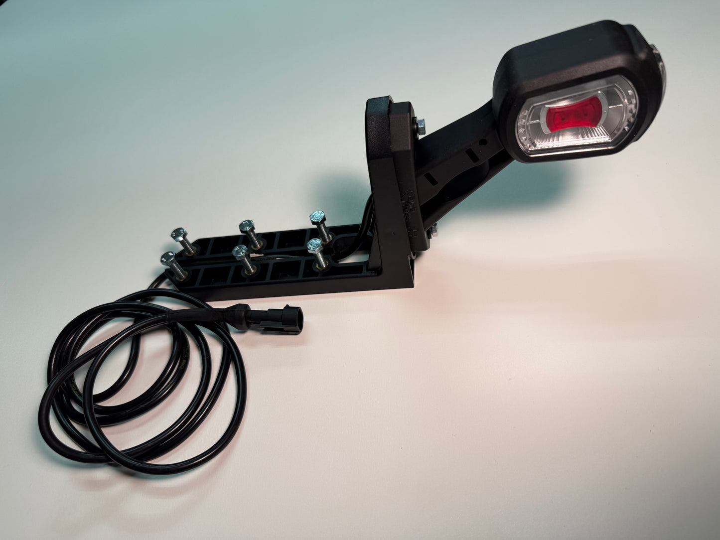 Top Bumper Mounting Bracket For Outline Marker Lights with wiring and bolts for trailer lighting installation.