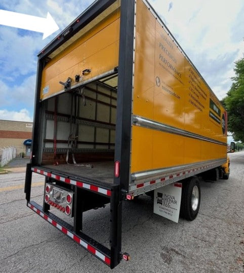LED Work Light (6500 K) RL 3042/BLACK mounted on the top rear corner of a yellow box truck.