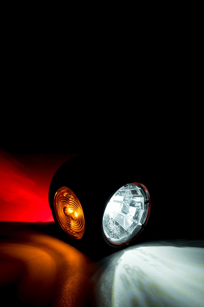 High-visibility red led marker light for enhanced safety on semitrucks, trailers, and commercial vehicles on heavy duty semitrucks, box trucks, trailers, vocational, passenger, fire trucks, and commercial vehicles.