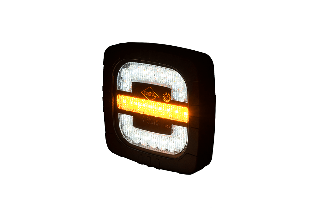 Front Multifunction Light ROCA LZD 2799 showing bright white position light and amber direction indicator in rugged housing.