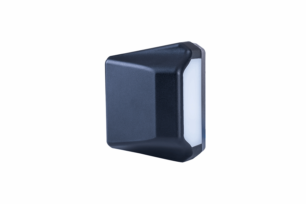 Black rectangular license plate light on a white background