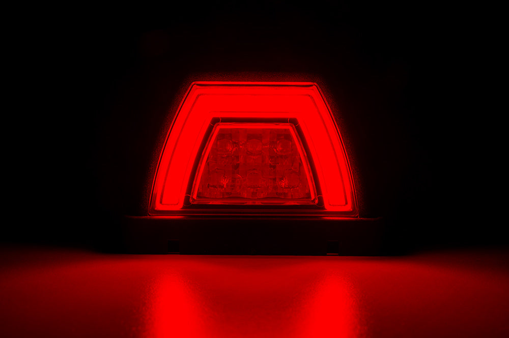 Rear Roof Multifunction LED Light with Tail & Indicator LZD 3089 glowing red in dark with clear neon outline and LED array.
