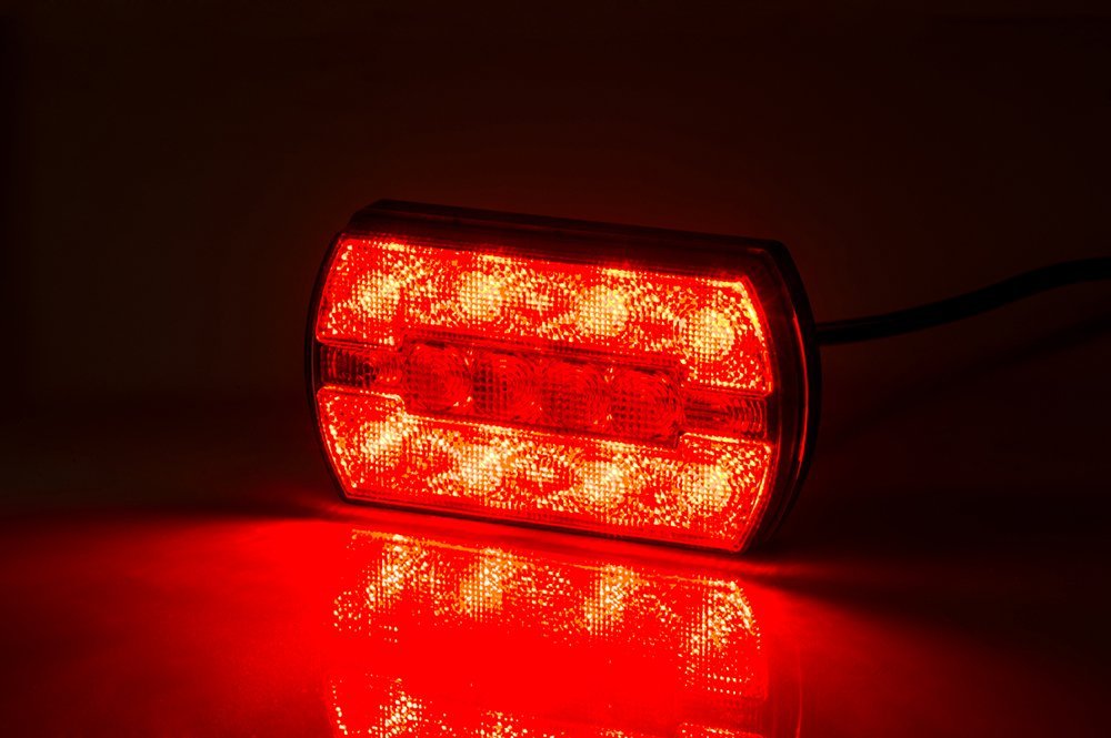 3 Function Rear LED Light Carla LZD 2791 showing bright red illuminated LED rear position, brake, and indicator light.