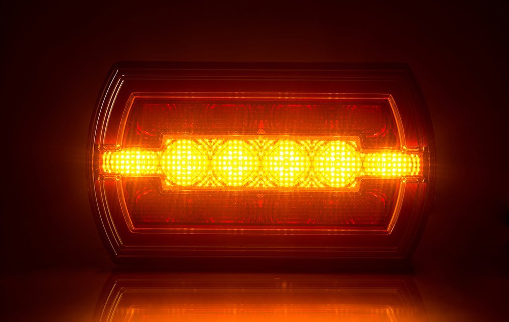 Multifunction Rear LED Light Cleo LZD 2790 glowing amber turn indicator light for vehicles and trailers.