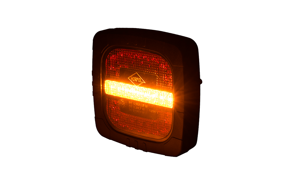 Rear 3 Function LED Lamp ROCA LZD 2800 showing bright amber turn signal function on black casing.