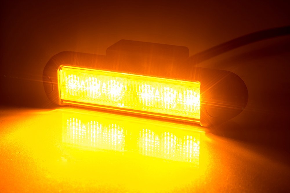 Amber LED Flashing Warning Light LDO 2780 glowing bright with six LEDs and amber light output for safety.