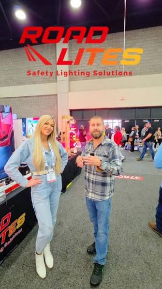 RoadLites co-founder Angie Twardawa at a trucking industry event showcasing LED truck and trailer safety lighting products