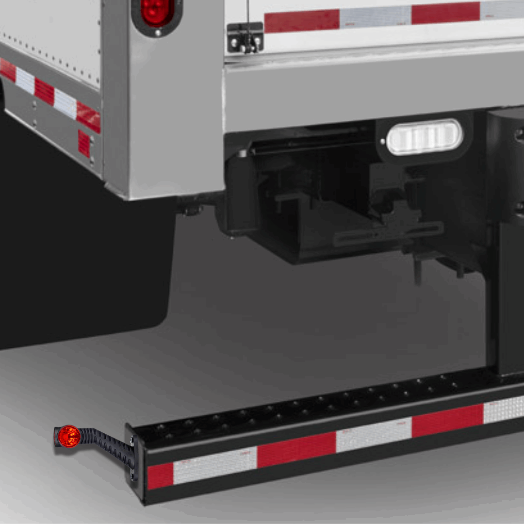 Close-up of a trailer bumper with roadlites outline marker light installed and a focus on the safety lights.