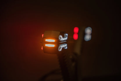 LED Extended Stalk Outline Marker Light Dragon LD 2994 showing orange and white LED illumination at night.