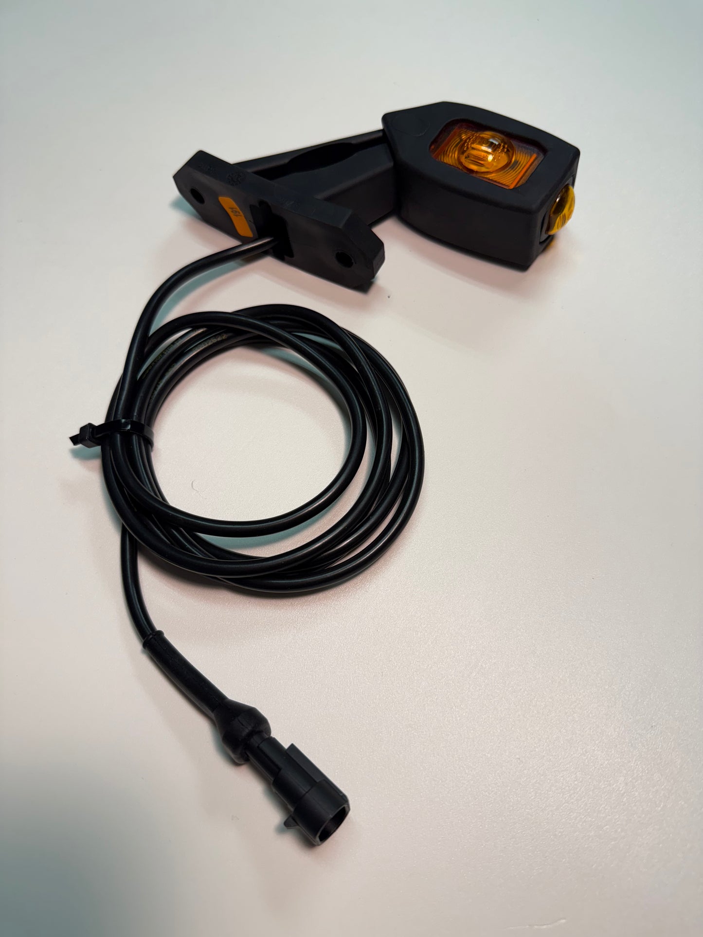Triple Auxiliary Amber LED Outline Marker Light Set LD 2109 with amber casing and long black wiring for vehicle side mounting.