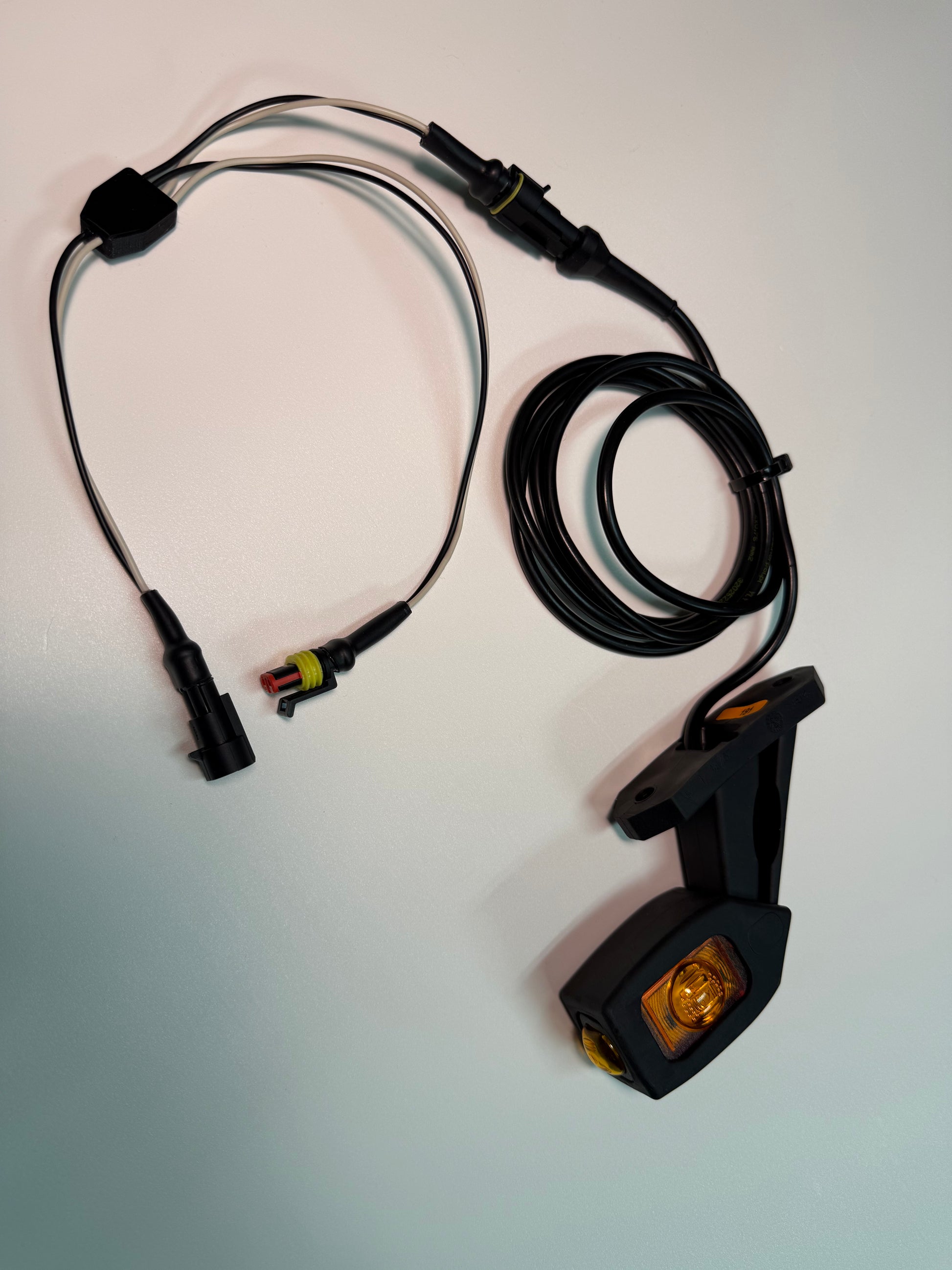Triple Auxiliary LED Outline Marker Light Set LD 2109 with amber lens and wiring harness for vehicle side mounting.