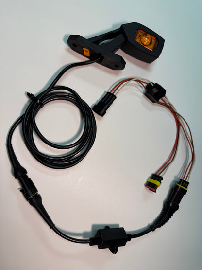 Triple Auxiliary LED Outline Marker Lamp Set LD 2109 with amber lens, wiring harness, and mounting arm for vehicle visibility.