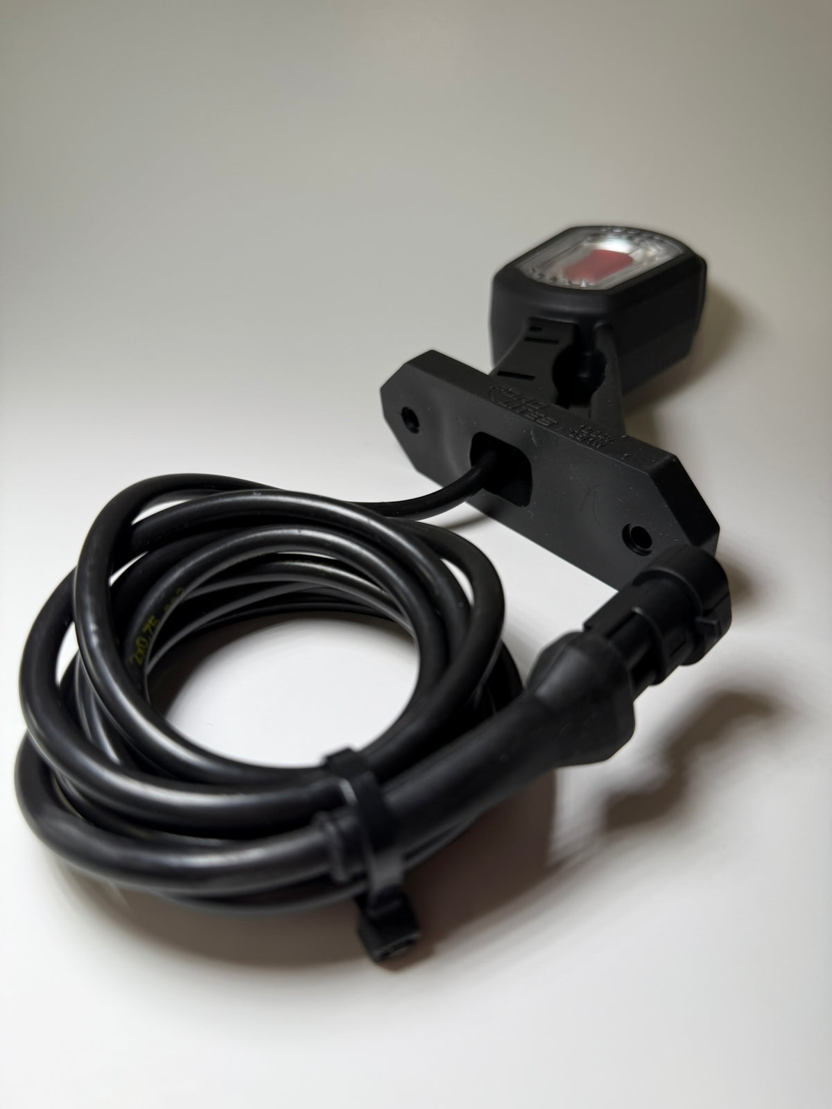 Close up of RoadLites right LED Side Outline Marker Light LDCC 2697 with superseal connector