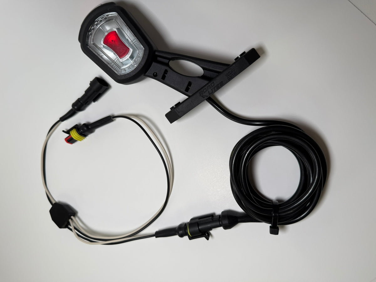 Close up of RoadLites right LED Side End Outline Marker Light LDCC 2697 with superseal connector and superseal harness