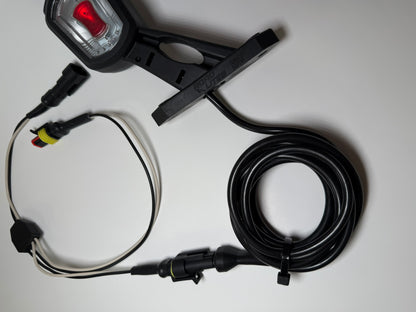 Close up of RoadLites right LED Side Outline Marker Light LDCC 2697 with superseal connector and superseal harness