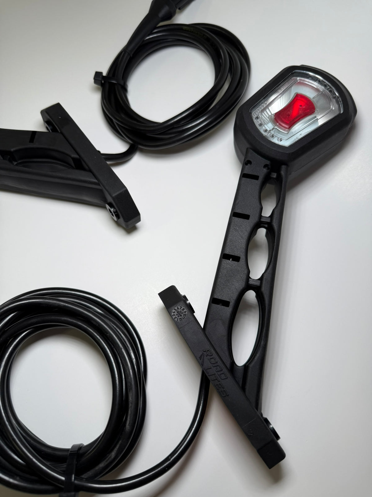 Close up of RoadLites Right Long Arm Outline Marker Light LDCC 2699
