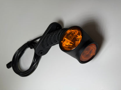 Close up of 1 left side RoadLites Triple LED Auxiliary Side Arm Outline Marker Light LD 2181 with amber side and amber front marker lights