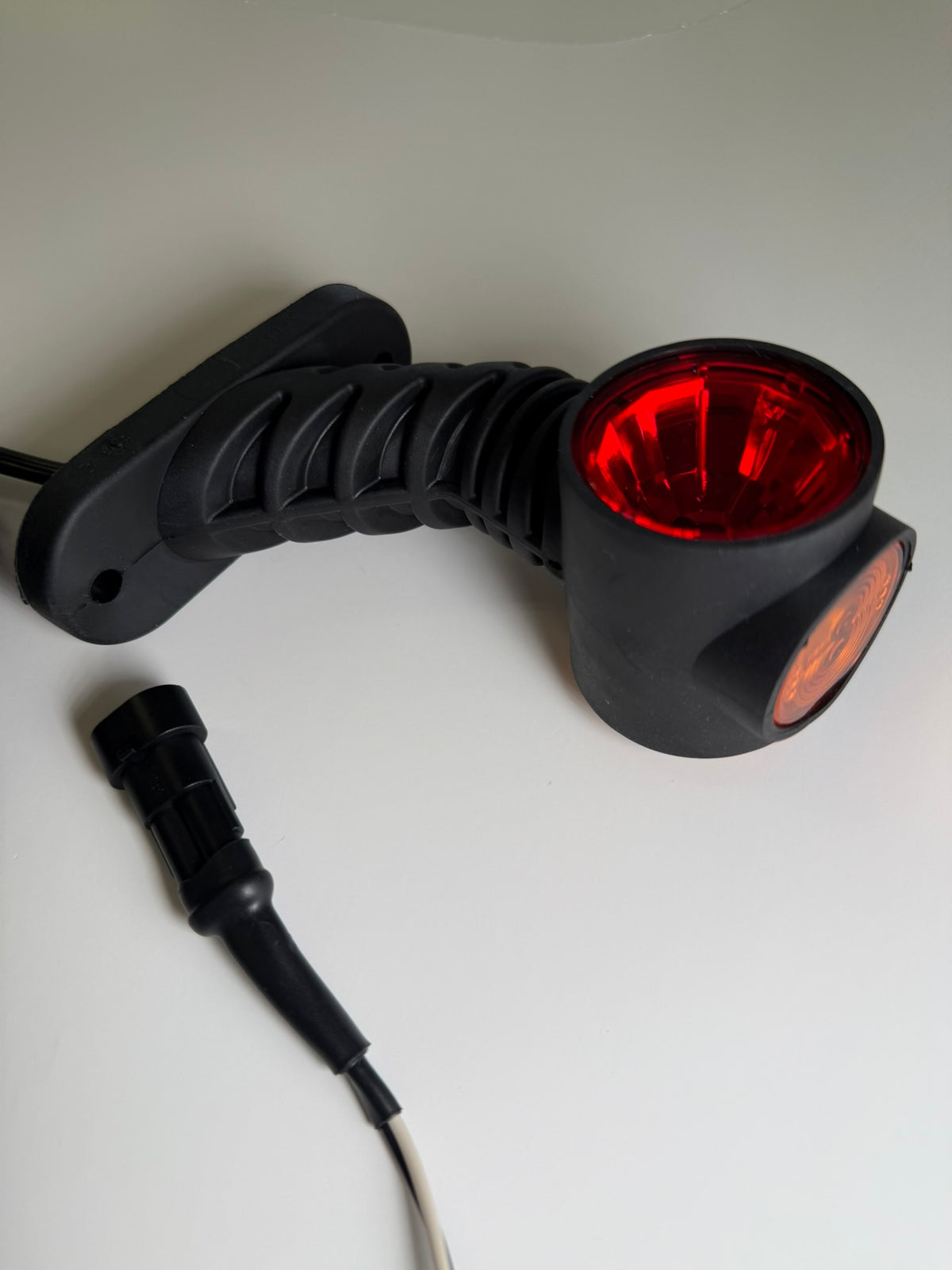 Close up of 1 right side RoadLites Triple LED Auxiliary Side Arm Outline Marker Light 2180 and superseal connector cable