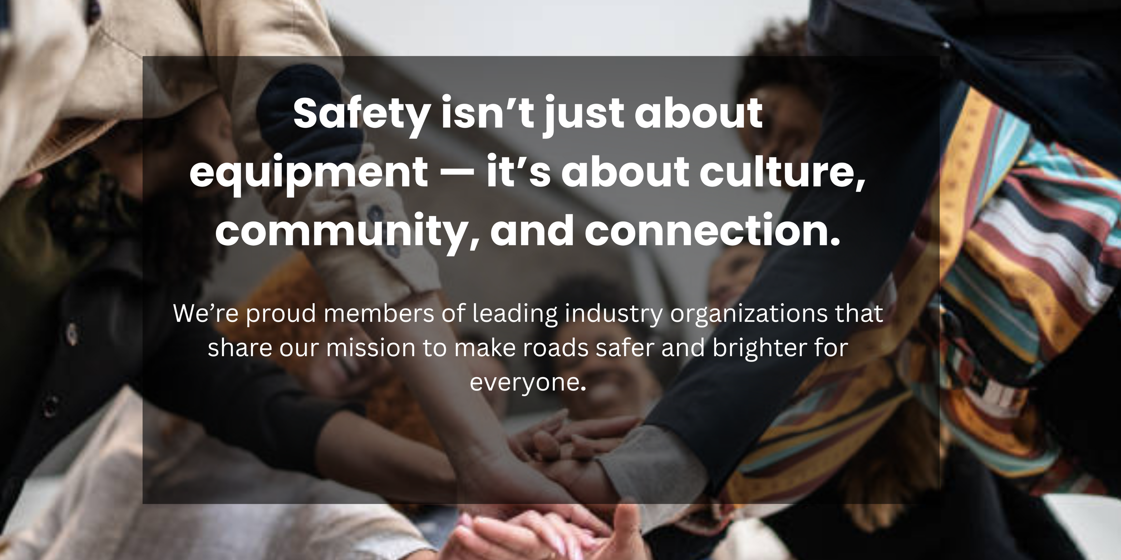Two people shaking hands with a quote about safety, culture, community, and connection overlayed.
