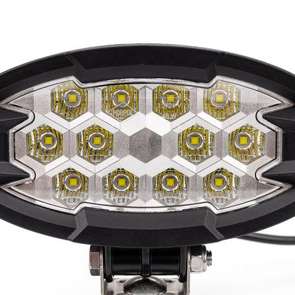 Close up of LED work light, 5500-lumen 12-LED auxiliary lamp for trucks, agricultural, construction equipment, and off-road vehicles.