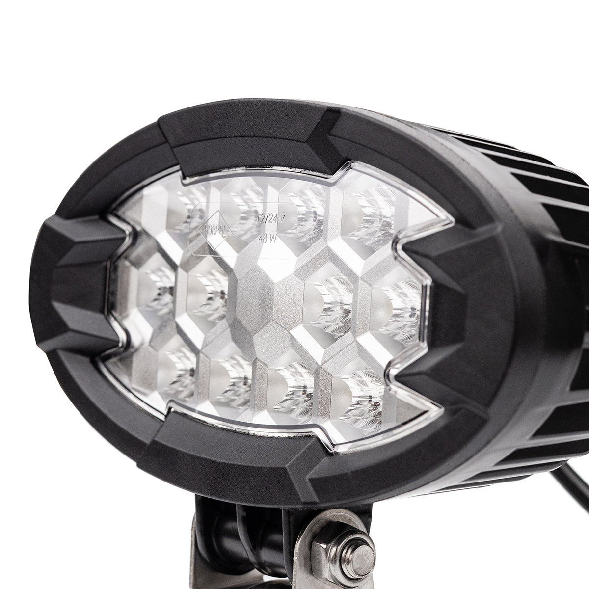 Close up of LED work light, 5500-lumen 12-LED auxiliary lamp for trucks, agricultural, construction equipment, and off-road vehicles.