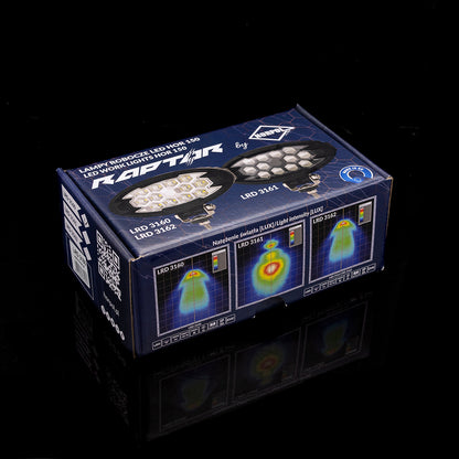 Box of Oval LRD 3160 RAPTOR LED work light glowing, 5500-lumen 12-LED auxiliary lamp for trucks, agricultural, construction equipment, and off-road vehicles