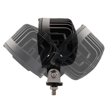 Black oval LRD 3160 RAPTOR LED work light glowing, 5500-lumen 12-LED auxiliary lamp for trucks, agricultural, construction equipment, and off-road vehicles