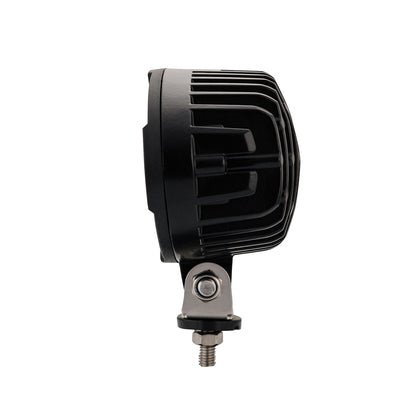 Side view of Oval LRD 3160 RAPTOR LED work light glowing, 5500-lumen 12-LED auxiliary lamp for trucks, agricultural, construction equipment, and off-road vehicles