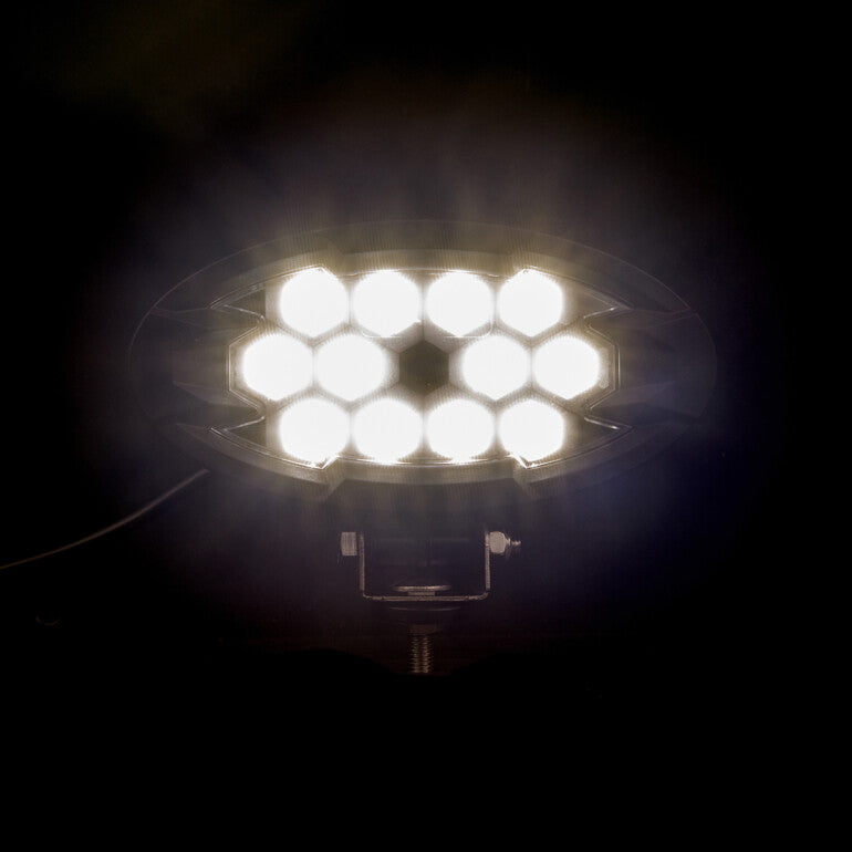 Work light RAPTOR (dispersed light, 2500 lm) LRD 3161 illuminated with bright white LEDs in dark setting
