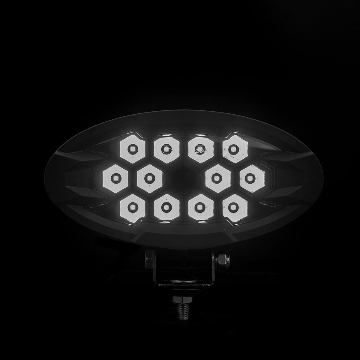 Work lamp RAPTOR (focused light, 2500 lm) LRD 3167 showing bright hexagonal LED modules with mounting bracket on black background