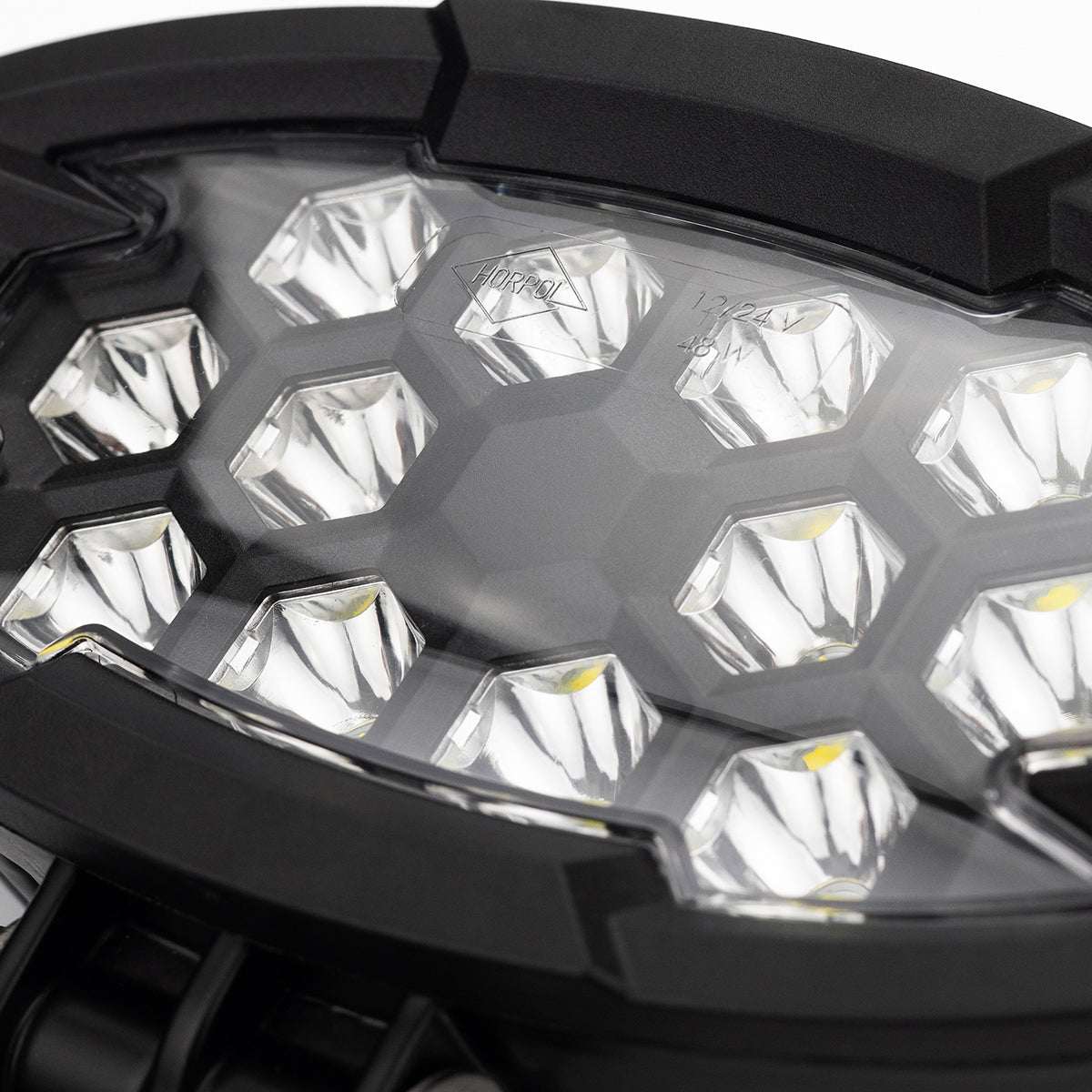 Work light RAPTOR (focused light, 5500 lm) LRD 3169 close-up of hexagonal LED reflectors in black protective housing