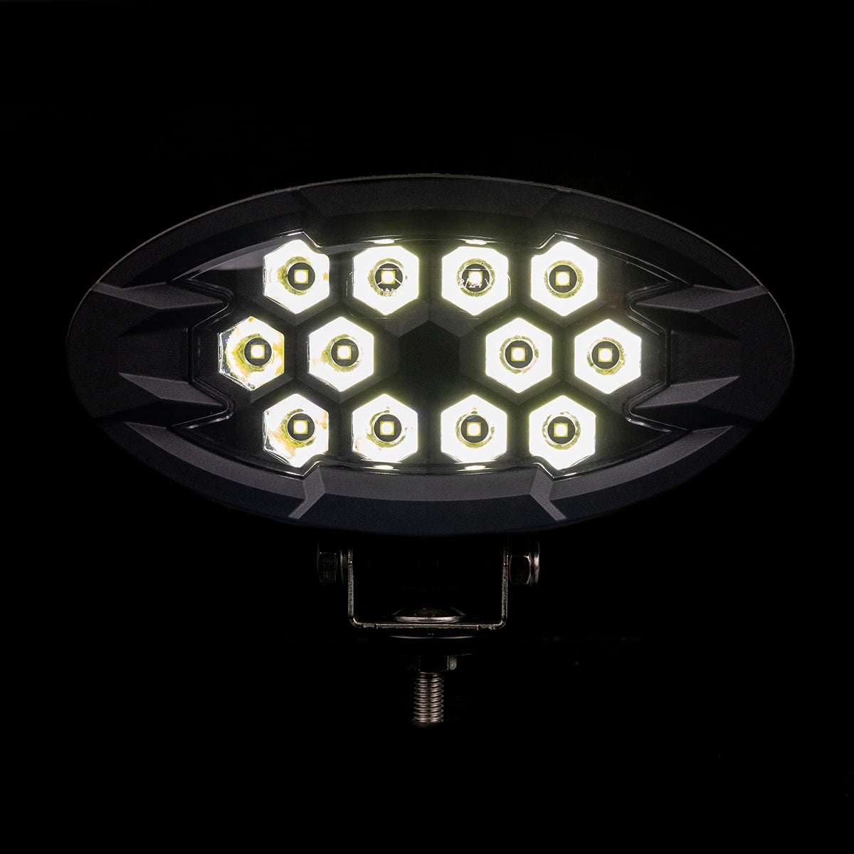 Work light RAPTOR (focused light, 5500 lm) LRD 3169 showing illuminated hexagonal LED clusters in oval housing with metal mounting bracket