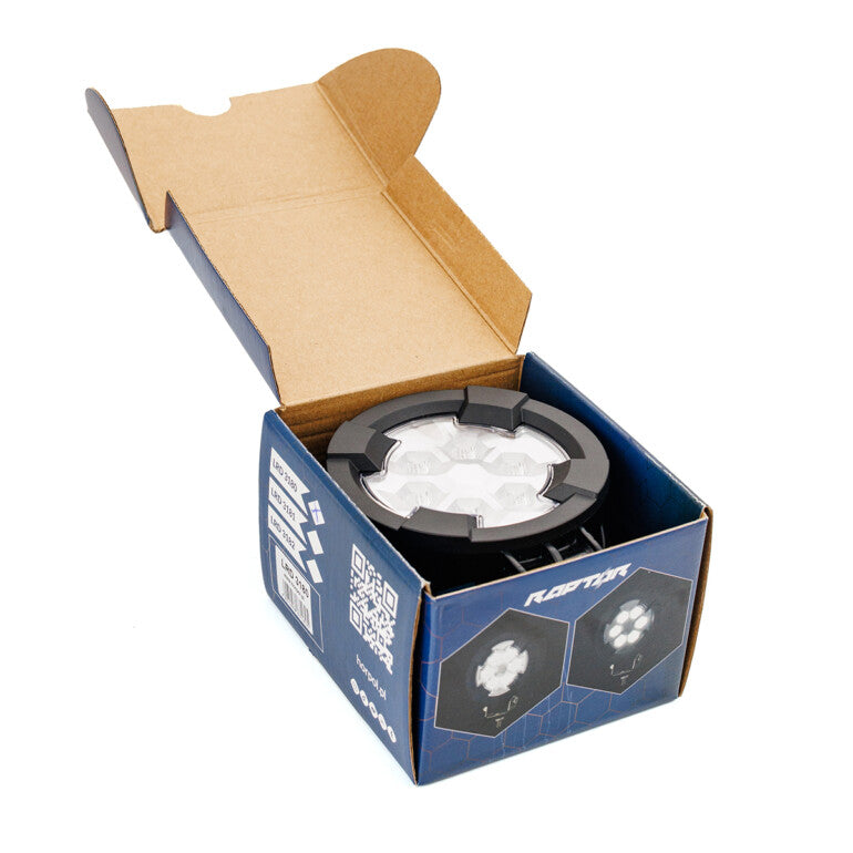 Work light RAPTOR (dispersed light, 2600 lm) LRD 3180 in open box showing LED lamp cluster and outer casing