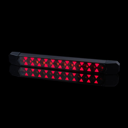 Rear Multifunction Amber and Red LED Light With Static Direction Indicator LIZARD LZD 3140 showing bright red LEDs on black background.