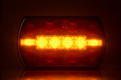 3 Function Rear LED Light Carla LZD 2791 showing illuminated brake and indicator lights in amber and red colors.