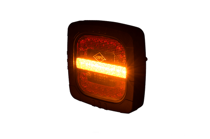 Rear 3 Function LED Lamp ROCA LZD 2800 showing bright amber turn signal function on black casing.