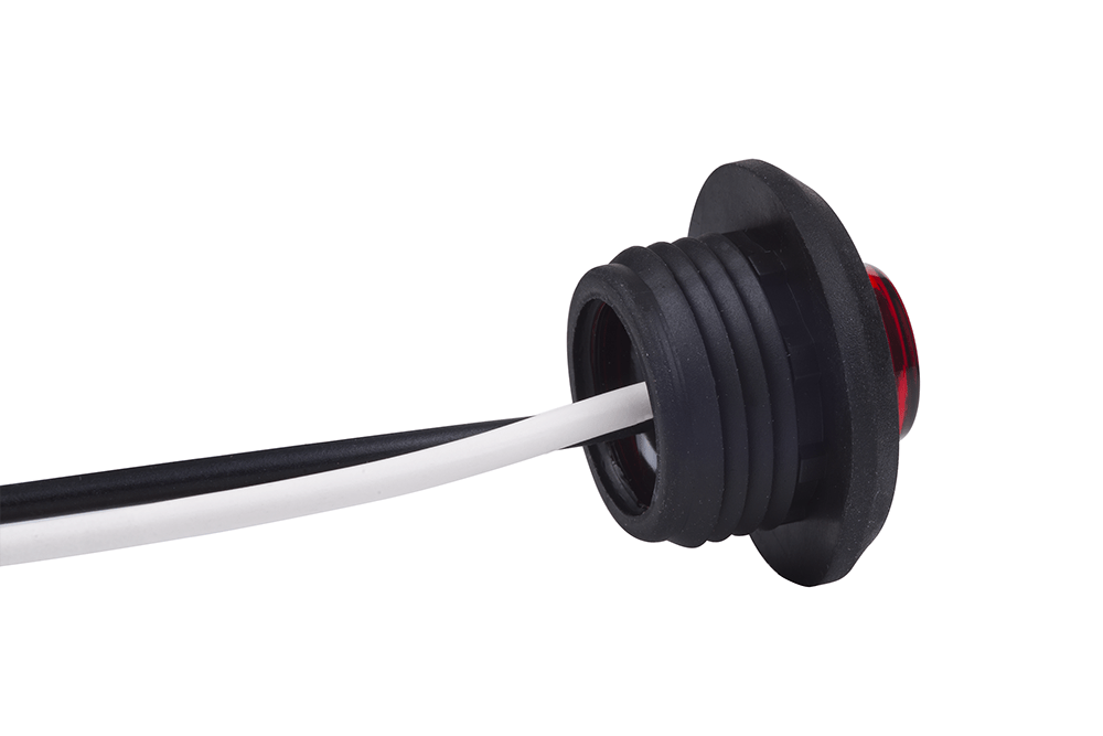High-visibility red led marker light for enhanced safety on semitrucks, trailers, and commercial vehicles on heavy duty semitrucks, box trucks, trailers, vocational, passenger, fire trucks, and commercial vehicles.