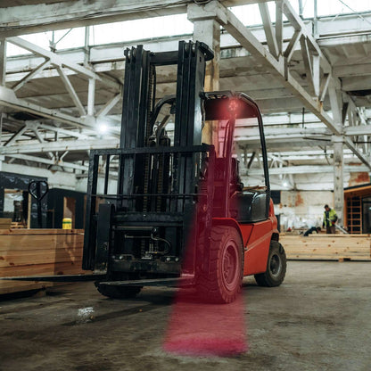Work light RED SPOT RAPTOR (focused beam, 650 lm) LRD 3186 mounted on forklift emitting focused red beam on floor